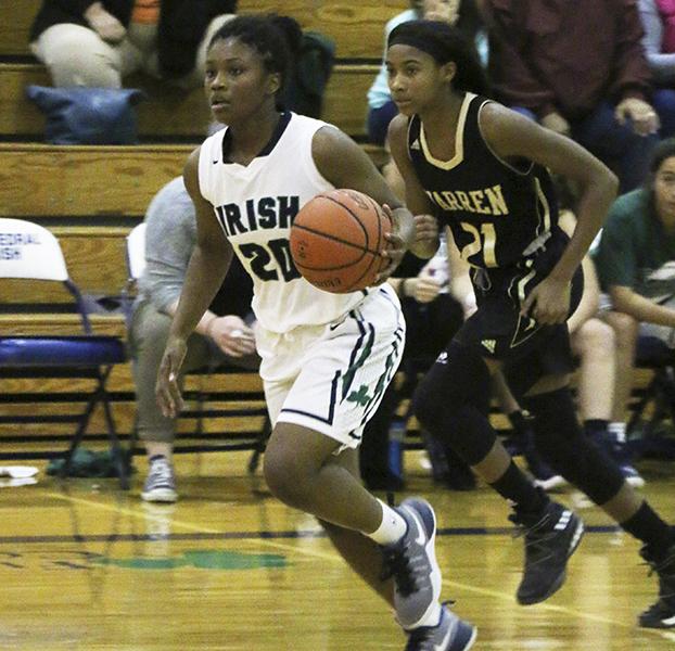 During the Warren Central game on Nov. 8, a 49-44 loss to the Warriors junior Keya Patton brings the ball up the court. Patton scored 26 of the team’s 44 points and is averaging 22.6 points per game.
