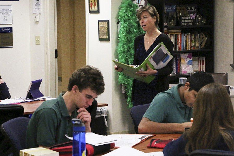 Juniors Audrey Teasley, Jake Welch and Chase Santamaria take notes in Mrs. Lizabeth Bradshaw Theory of Knowledge course. 