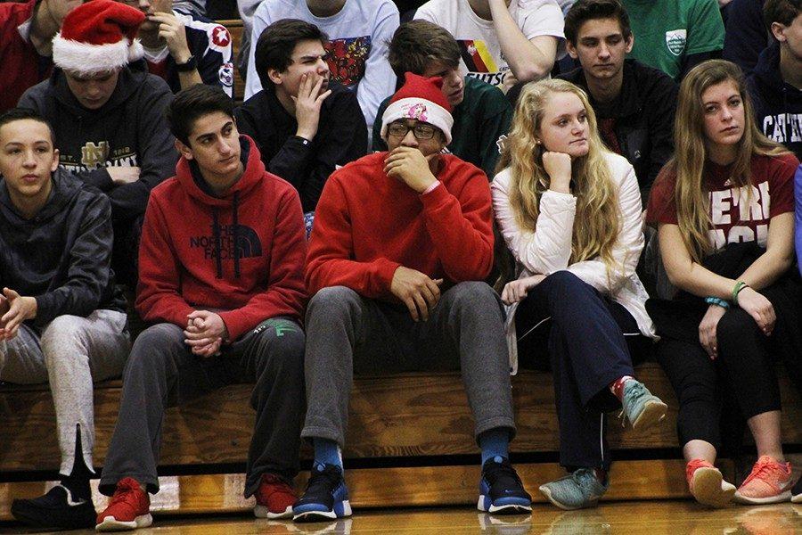 Students dress up for “Holidaze Tuesday” while they wait for the Black History Month Assembly to begin. 