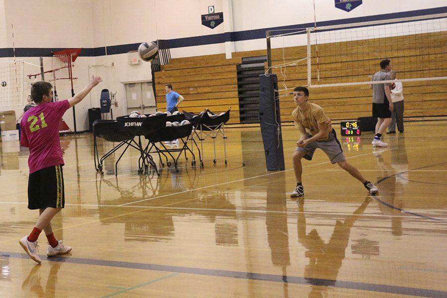 The Mens volleyball team practices on March 9th in the Welch Activity Center.