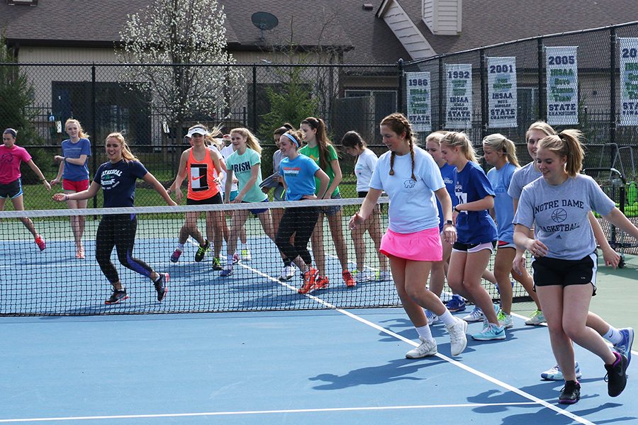 Women's tennis practices after school.