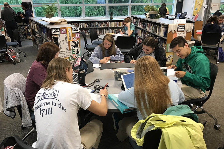 As final exams approach, the library is a popular place for study groups to meet. 