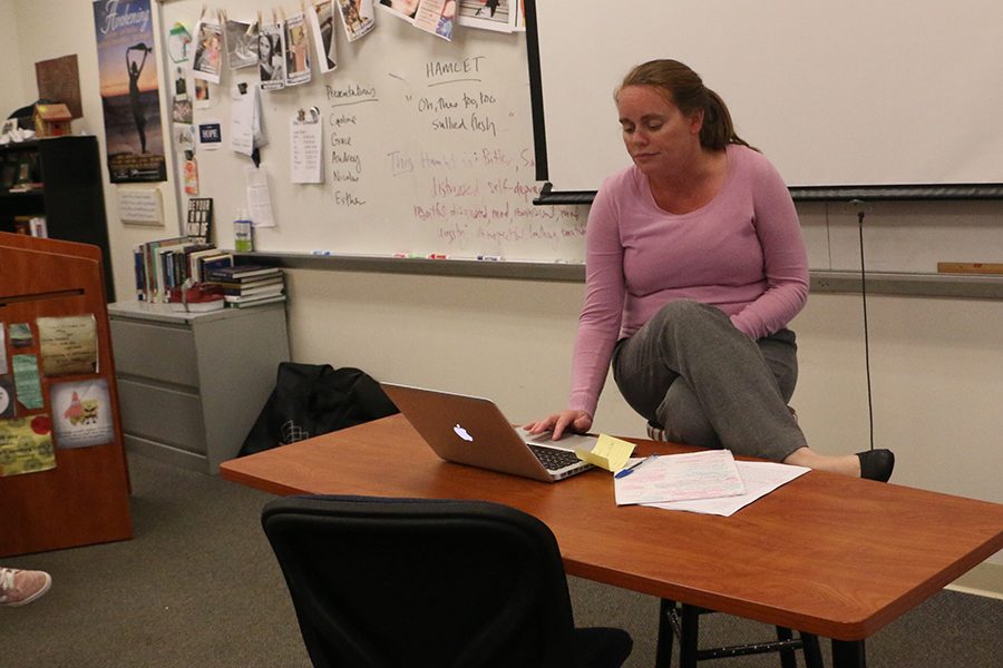 Mrs. Elizabeth Van Wienen, who teaches English and coordinates the IB program, instructs her senior IB English class during C period on Oct. 10.