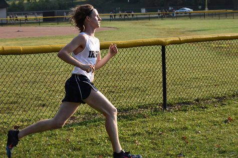 Junior Cole Hocker runs earlier in the season at the Plainfield Relays. Hocker and his fellow runners will compete in the mens cross-country State Finals on Oct. 28 in Terre Haute. 