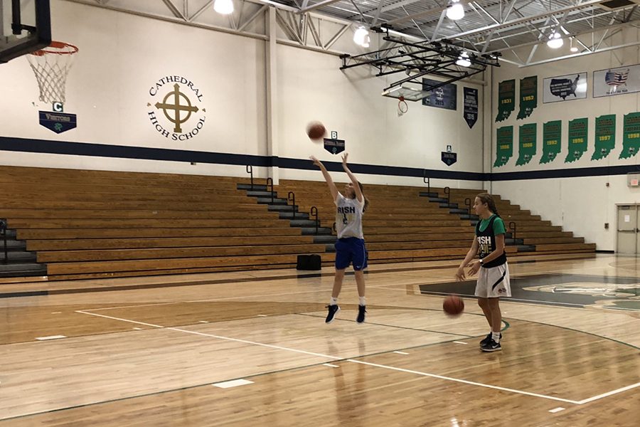 Oct. 27 after school, freshman Kieran McCauley shoots free throws in the Welch Activity Center. 