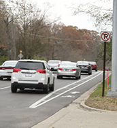 The bike lanes begin just east of campus. So far, they have not affected the flow of traffic. 