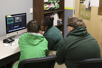 Senior Alexander Dall and juniors Nandi Hawkins and Blake Bridges work on a project during their Period C broadcasting class on Nov. 8. 