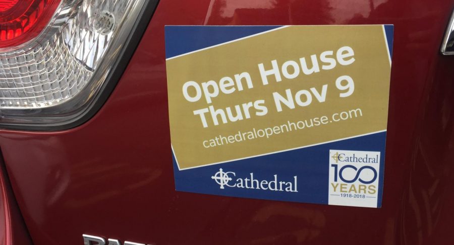 A car in the teacher's lot next to the Welch Activity Center sports a magnet publicizing the Nov. 9 Open House. 