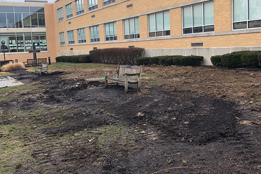 The muddy lawn in front of Kelly Hall shows the effect of equipment that was used to repair the Jan. 9 water main break. 