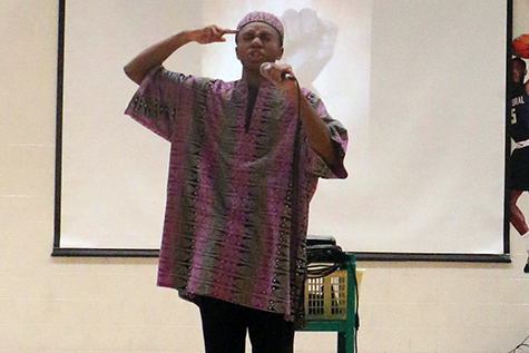 Senior Gabe Ratcliffe reads an original work for the Black History Month assembly.