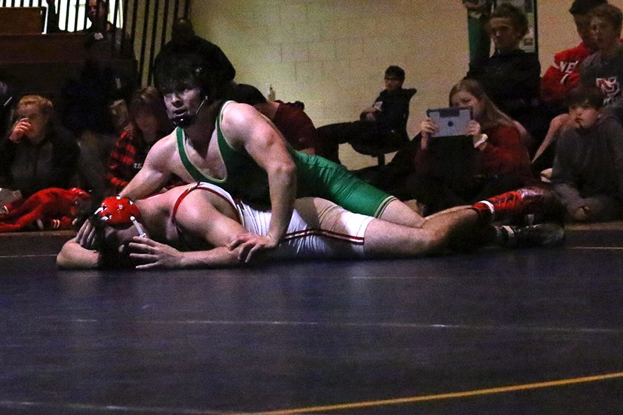 Junior Luke Adams is one of 13 Irish wrestlers who will compete in the Feb. 10 Semistate at New Castle.