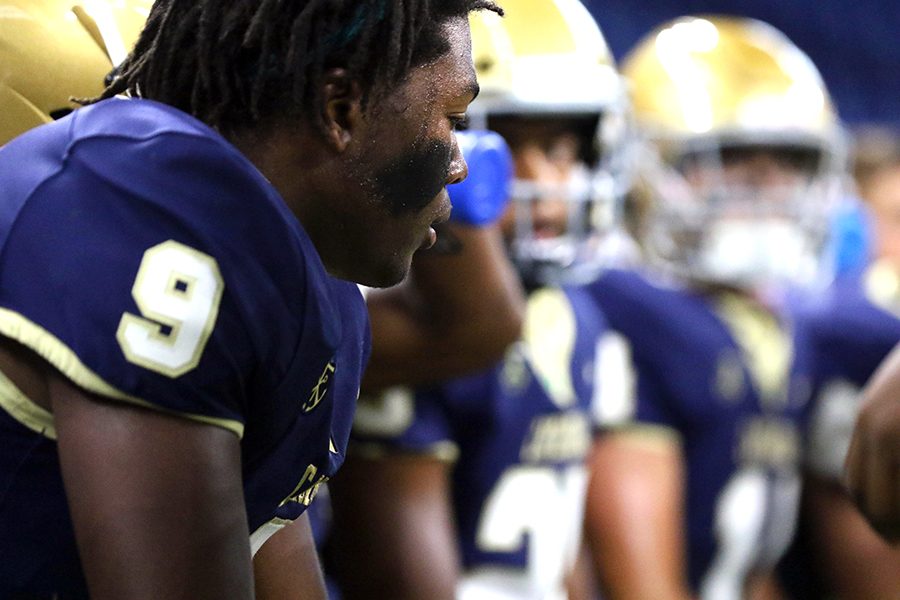 Senior Judah Officer and his teammates will host Cincinnati Elder on Aug. 31 at Marian University. Elder is shown on the sideline during the team's season opener, a 31-7 win over Noblesville. 