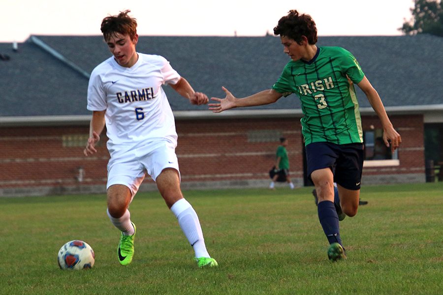 The men's soccer team, shown in action earlier in the season against Carmel, opens Sectional play on Oct. 3. 