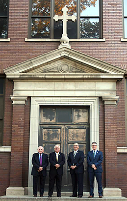 All four school presidents n Cathedral's history stood on the same spot where a photo taken 100 years before marked the opening of the school. 