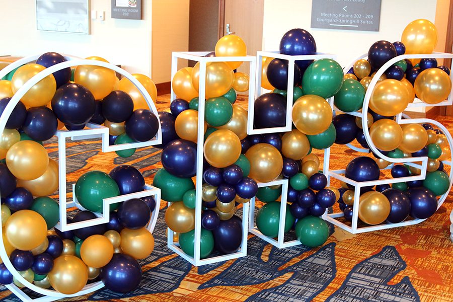 Balloons in school colors greeted guests at the 100-year gala last month. 