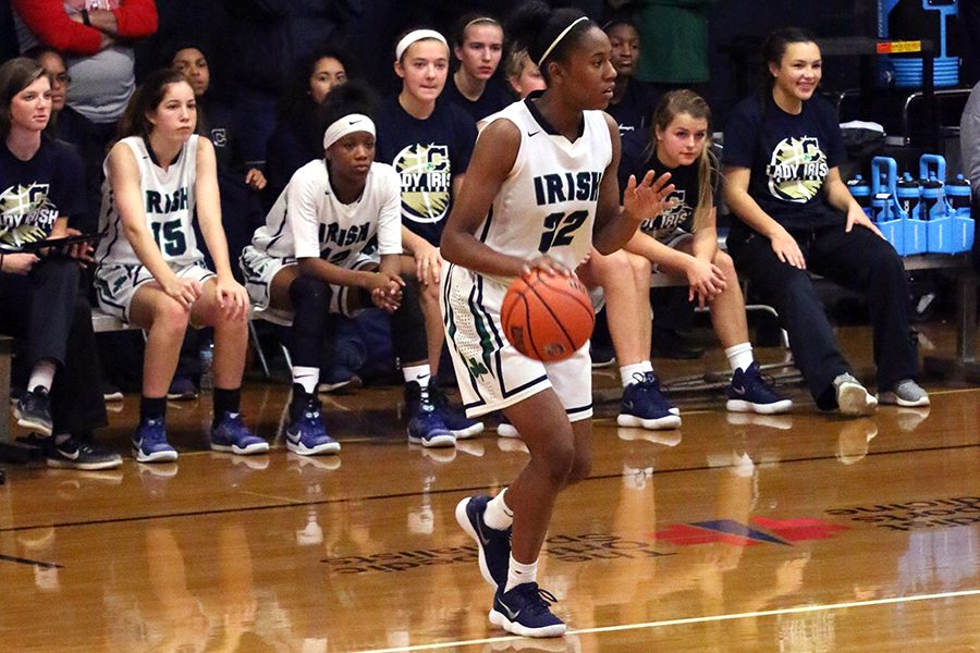 Junior Justis Gordon, shown in action last year, will lead the women's basketball team in its opening games the week of Oct. 30. 