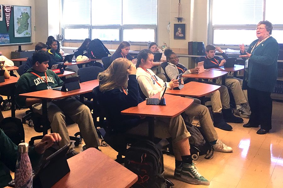 Sr. Mary Ann Stewart instructs her G period history class on Oct. 17. Sr. Stewart said she encourages all students who registered to vote to cast their ballot on Nov. 6. 