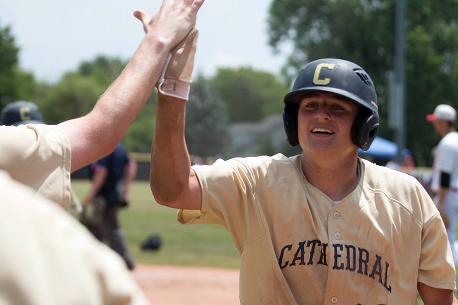 Senior Cole Vassilo, shown during the baseball Sectional championship game last season, will be one of the players providing instruction during the Christmas baseball camp in December. 