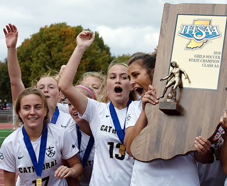 The women's soccer team celebrates its Class 2A State title. 