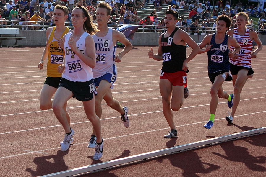 Senior Cole Hocker, second from left, runs in the State track meet last June at Indiana University. 