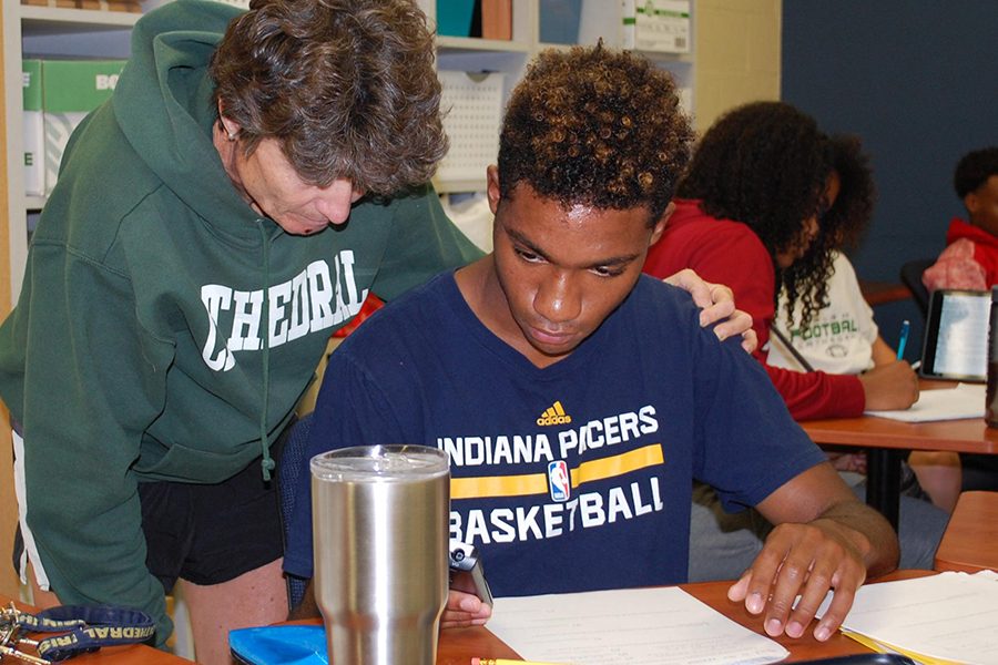 During second semester last spring, math teacher Mrs. Lisa Ford provides one-on-one instruction. 