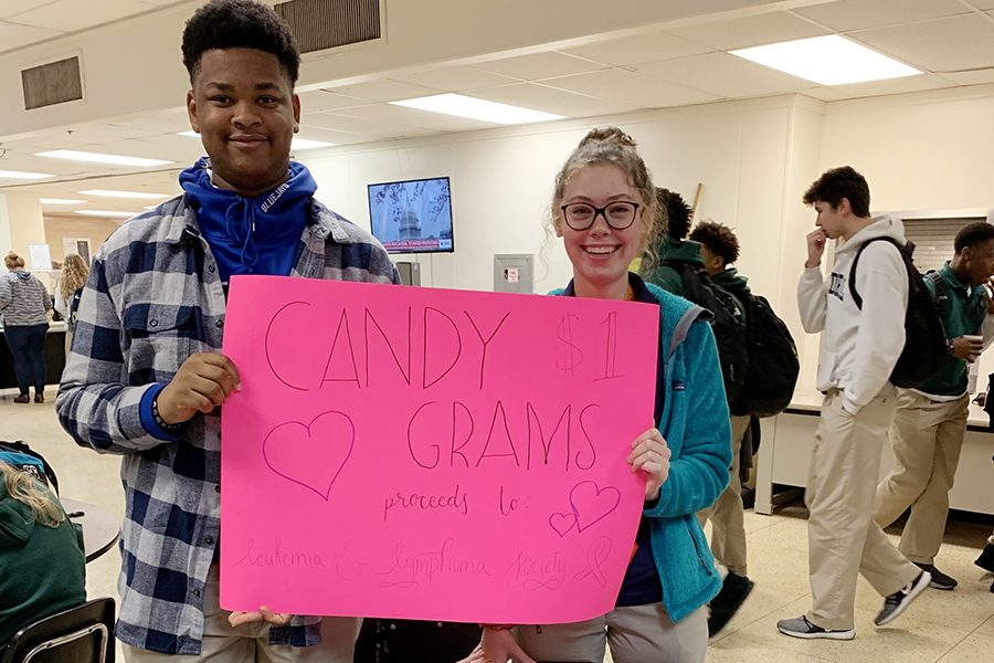 Senior Joshua Hall and sophomore Madison Ackley promote candygram sales.