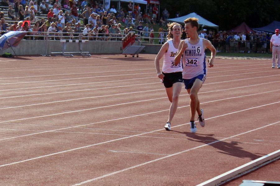 Senior Cole Hocker, left, competes at last year's State track meet at Indiana University. 