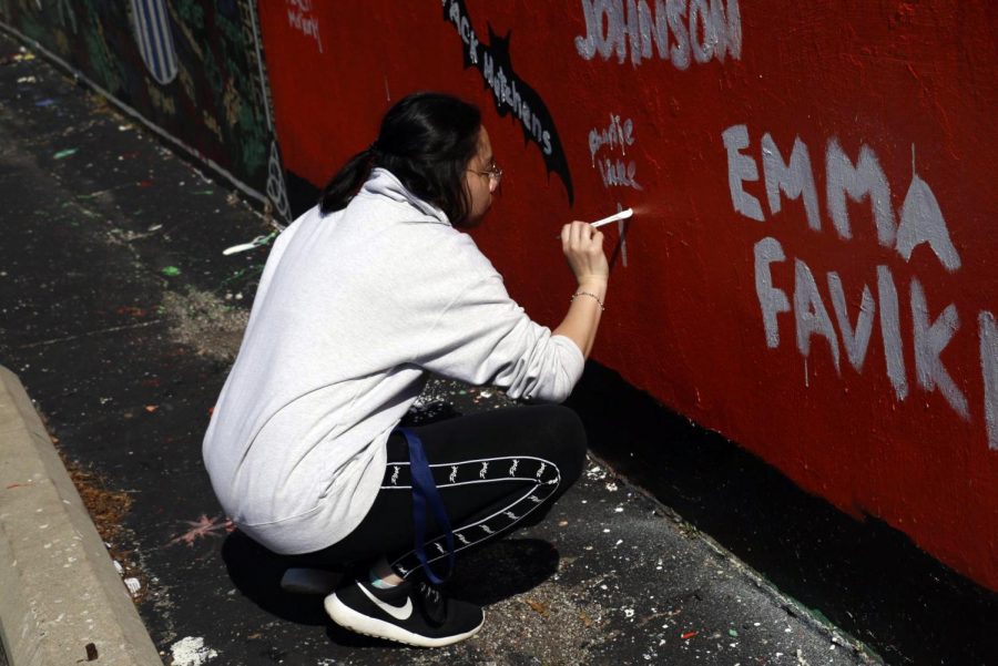 On the morning of May 14, seniors painted their section of the wall. 