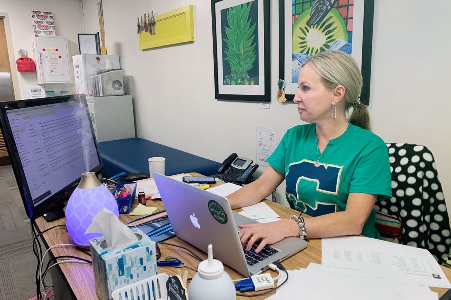 School nurse Mrs. Courtney Jennings-Sood works in her office earlier this school year. 