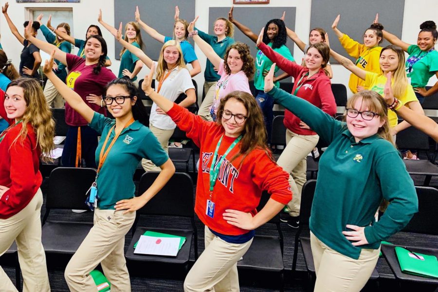 Members of the show choir, the Irish Adrenaline, practice during A period in Cunningham. 