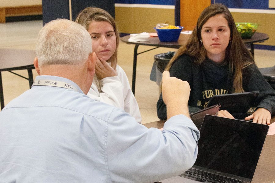 Director of counseling Mr. Duane Emery met with seniors during the college boot camp last August. He provided information about summer school this June. 