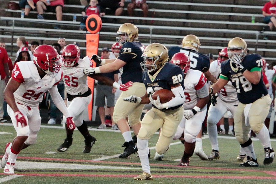 The varsity football team, in action earlier in the season during its 59-0 Homecoming win over Jeffersonville, will open Sectional tournament play on Nov. 1.