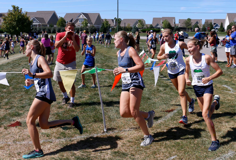 The women's cross-country team, shown participating in a meet last fall, has a new head coach. 