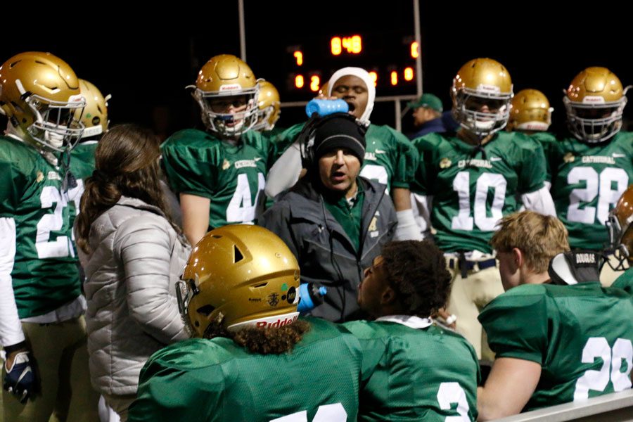 The football team will travel to New Palestine on Nov. 15 for the Regional championship game. The team receives instructions during its Nov. 8 win over Decatur Central in the Sectional title game. 