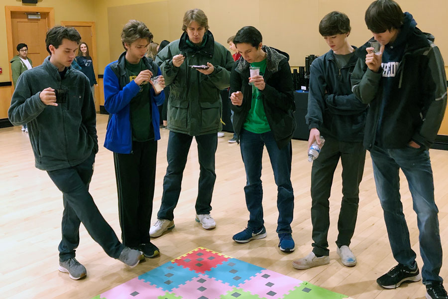 Students who participated in the Franklin College Math Day on Nov. 23 ponder a puzzle. 