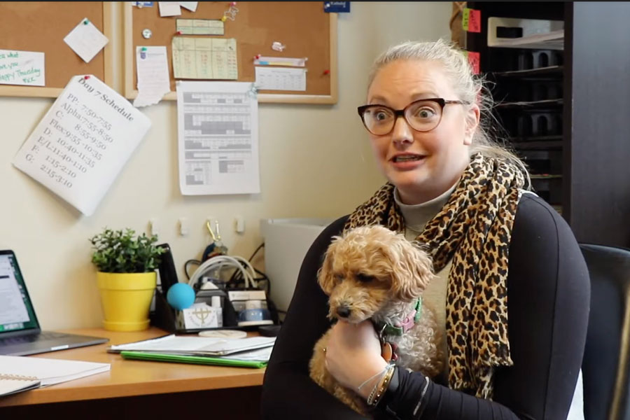 Counselor Mrs. Mary Hemer '09, with assistance from Muffin, offered advice to seniors for avoiding senioritis and staying on track during second semester. 