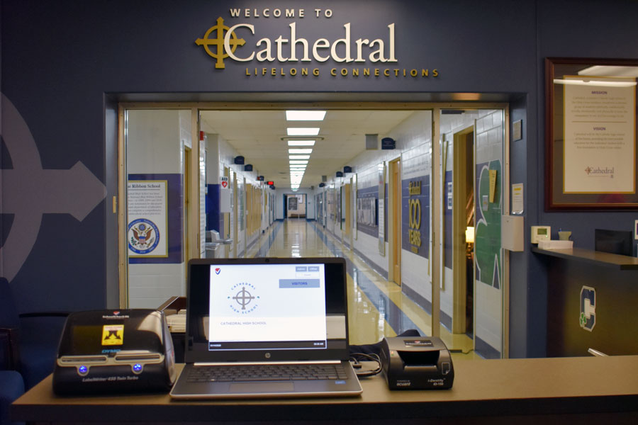 Visitors to the school now must check in at the front office and show their driver's license. 