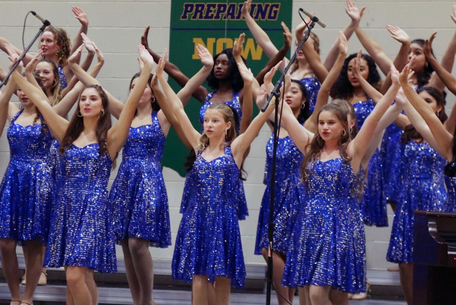 The show choir performs during Open House. 