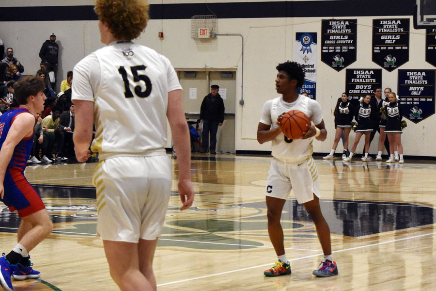 The men's basketball team, in action earlier in the season against Roncalli, will open Sectional tournament play against Crispus Attucks. 