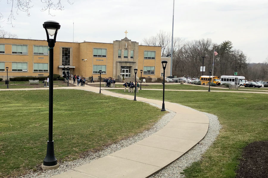 A few students linger on campus on the afternoon of March 12, the last day of on-campus classes during second semester. 