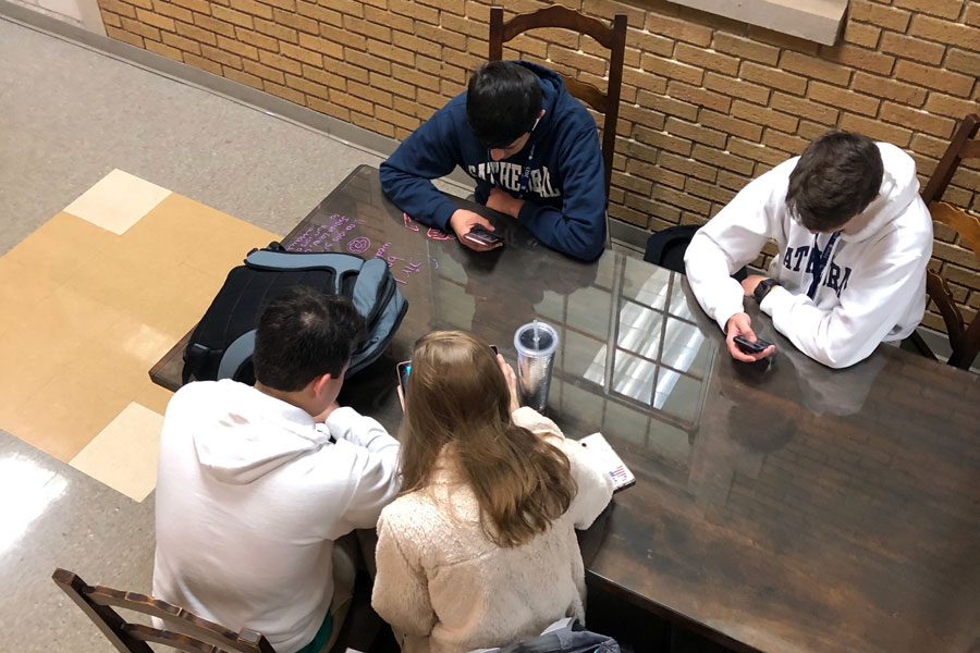 Students study in Loretto Hall before school on March 11. 