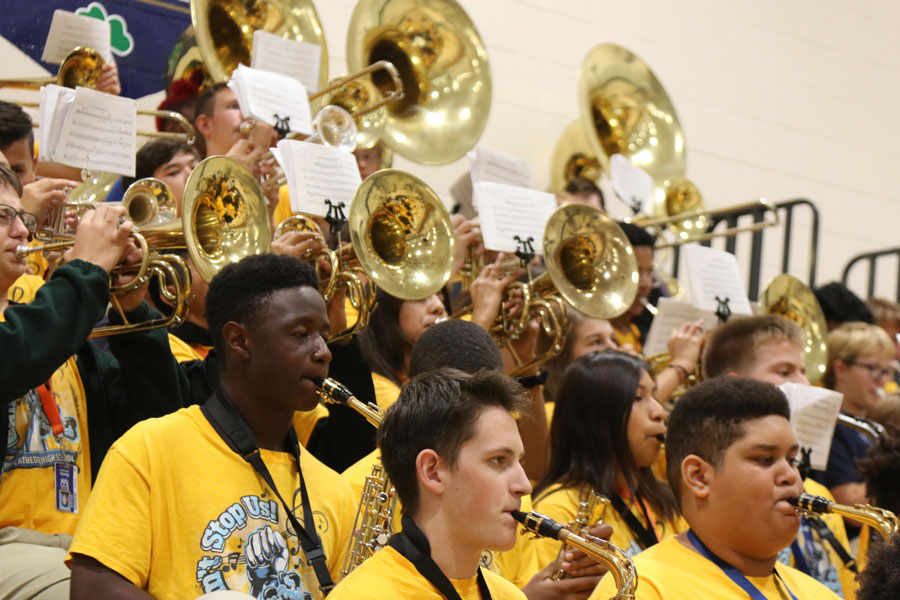 The pep band performs at a basketball game in the Welch Activity Center. 