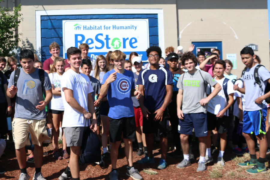 Students line up after working at a Habitat for Humanity facility during last year's spring break. 