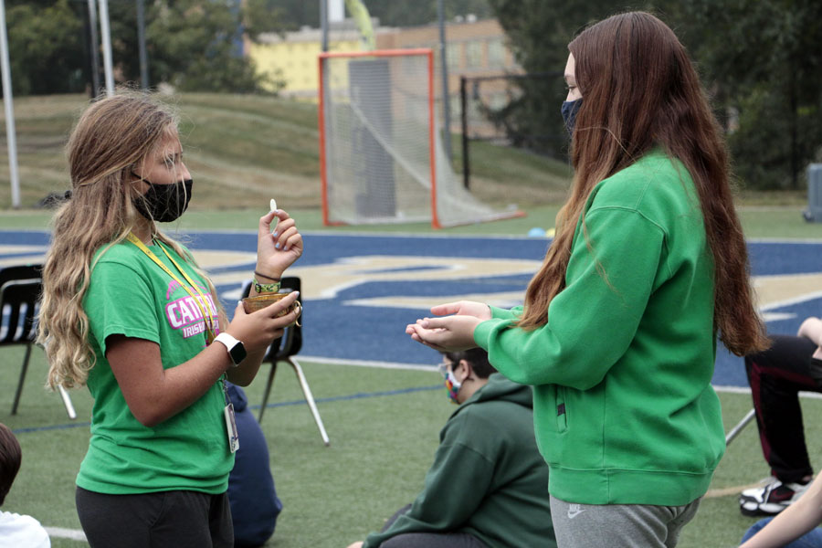 The freshmen, sophomores and juniors gathered for Mass on the football field on Sept. 11. 