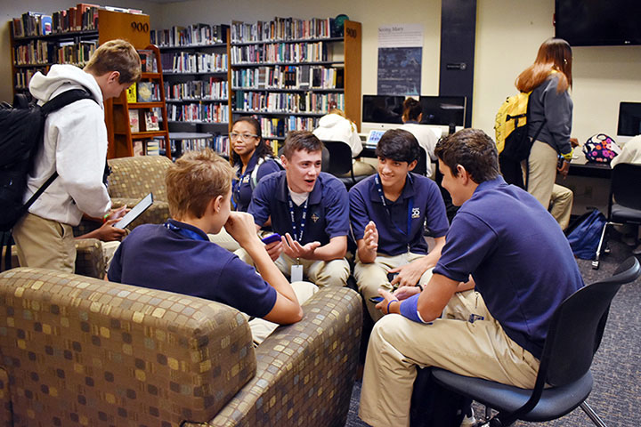 Scenes like this from last year, with students gathering in a group before school in the library, are now a thing of the past. This space is now occupied by Sr. Mary Ann Stewart’s social studies classes. 