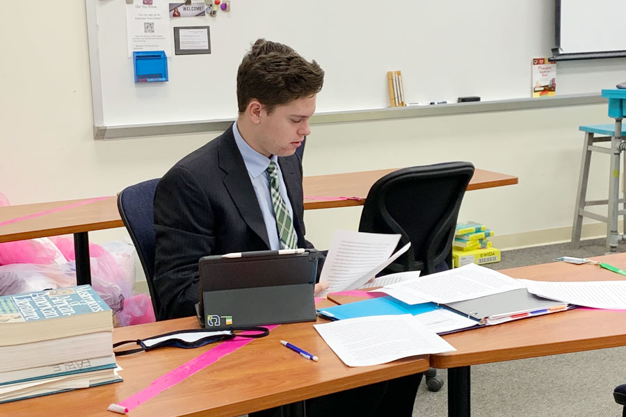 Freshman Sam Snyder participates in the State speech and debate meet on Jan. 31 in Loretto Hall. 