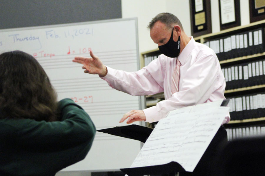 During alpha period on Feb. 11, Mr. Steve Goodman directs the orchestra, which practices in the basement of Cunningham Hall. Goodman brings a vast range of professional experience as a musician to the Hill to share with his students, who were practicing a piece called “No Bounds,” which the group would eventually perform with the jazz band.