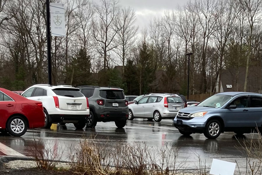 Students drive out of the H lot after school. If those drivers are following state law, they will not have a phone in their hands while they are on the road. 