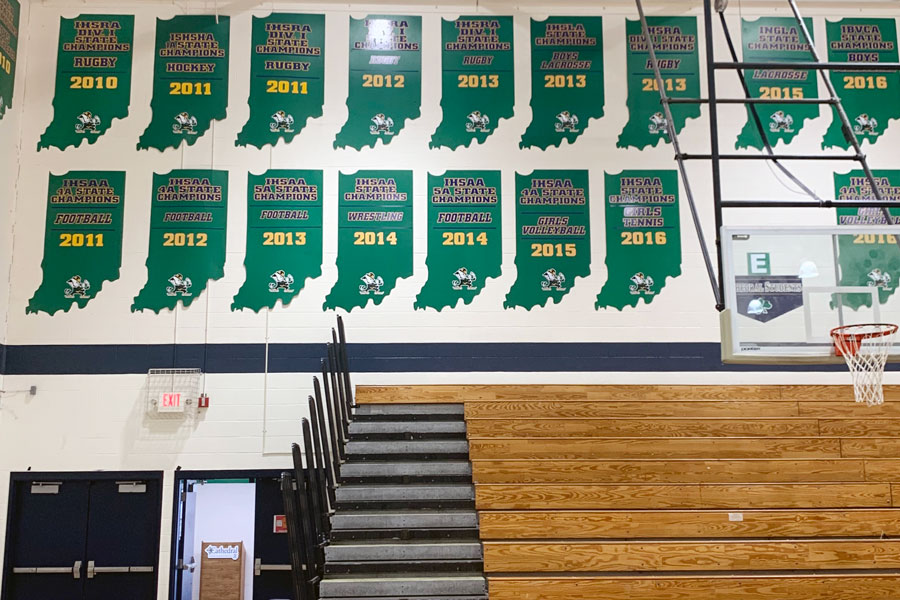 State championship plaques -- but none for conference titles - take up much of the wall space in the Welch Activity Center. 