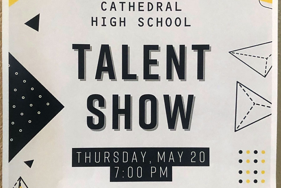 Posters around the school promote the May 20 talent show. 